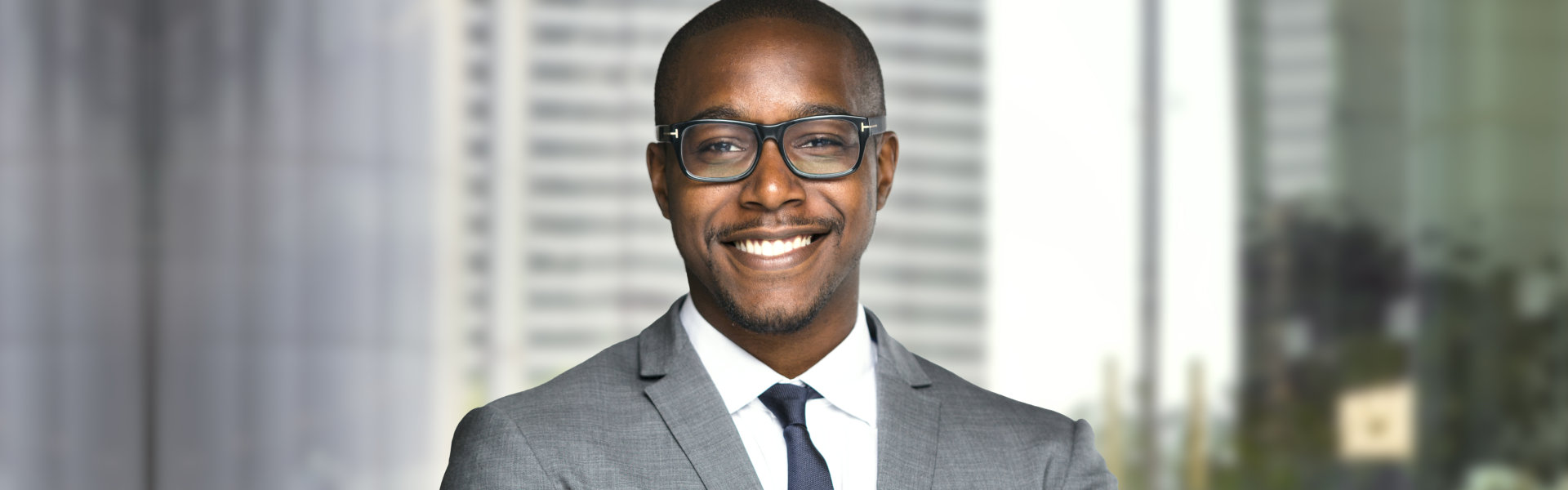 man with eyeglasses smiling