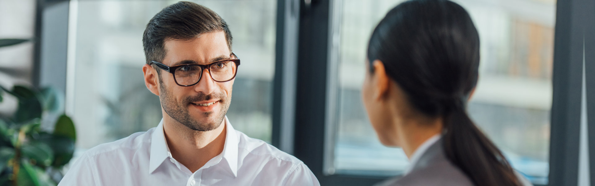 man smiling at the woman