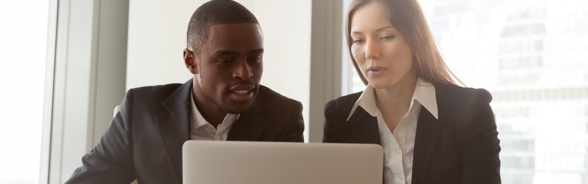 man and woman working together